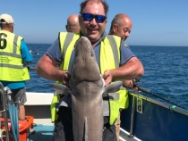 Cliff Newbold with his winning 64 pound conger