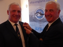 Gary Geoghegan recieving silver pin
